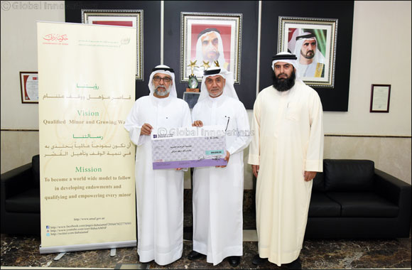 Awqaf and Minors Affairs Foundation Hands-over Cheque for AED200,000 to Tarahum Charity Foundation