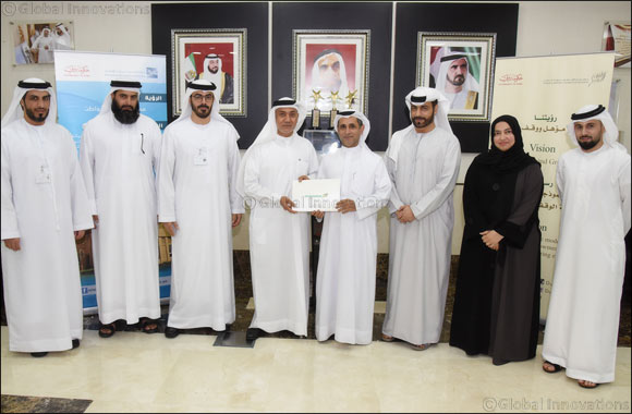 Awqaf and Minors Affairs Foundation Hands over AED400,000 to Mohammed Bin Rashid Housing Establishment