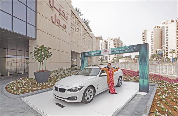 Filipina mum of three bags brand new BMW in Nakheel Mall's DSF promotion