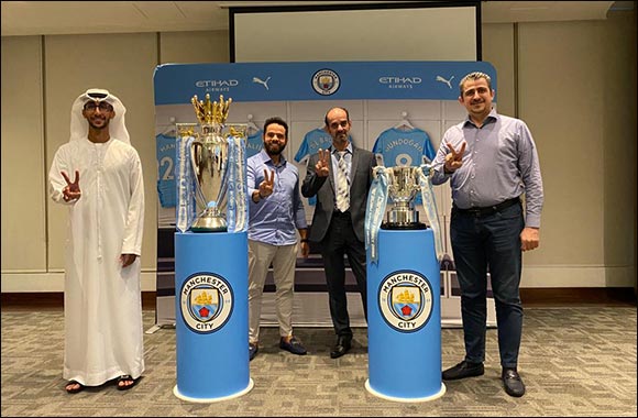 QNET Hosts Manchester City Premier League Trophy and Carabao Cup display