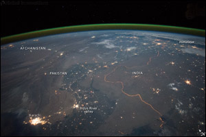NASA astronaut photographs Earth with Nikon D4
