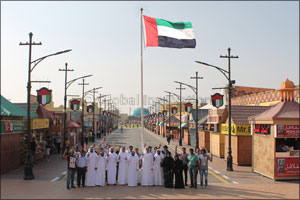 Global Village Raises The UAE Flag in Honor of National Flag Day