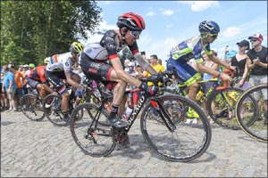 Martin Survives a Brutal Day of Racing on the Cobbles of Stage Nine