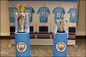 QNET Hosts Manchester City Premier League Trophy and Carabao Cup display