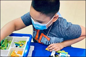 Robot Program in Children's City to Develop Creative Skills in Programming