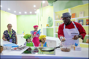 Children take Charge of the Kitchen during a Live Cooking Demo at 13th Sharjah Children's Reading Festival
