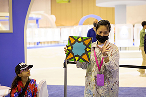 Children Try Their Hand at Islamic Tile Painting at SCRF2022
