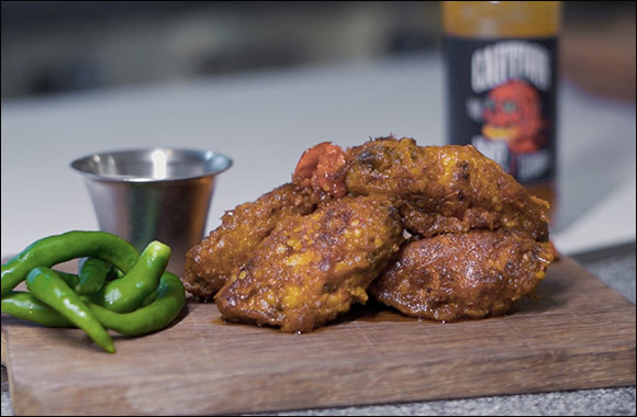 Just Wing It and Win at the Huddle Sports Bar and Grill