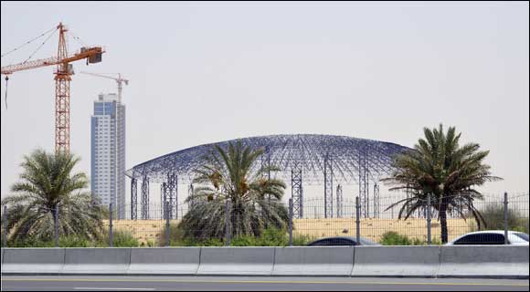 Excitement, as a significant section of a mega space frame is erected at IMG Worlds of Adventure