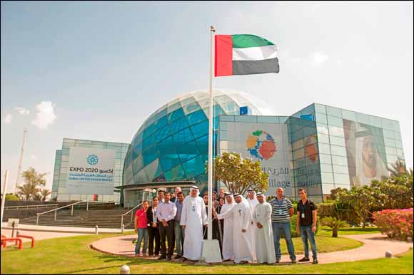 Global Village Raises the UAE Flag Besides Its Head Office