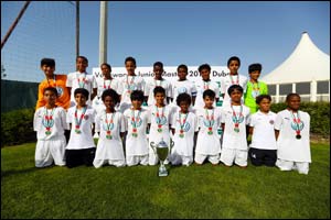 Al Nabooda Automobiles celebrates Al Jazira Club win at Volkswagen Junior Masters football tournament