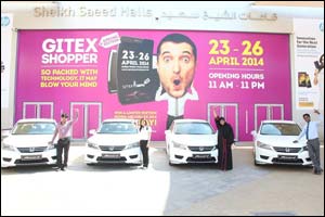Four ecstatic GITEX Shopper Spring winners drive off in a Limited Edition Honda Accord