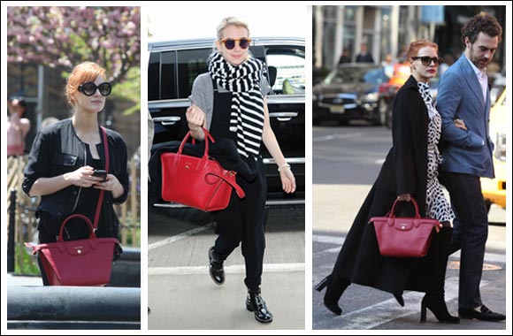 Jessica Chastain and Emma Roberts wearing  the Longchamp Le Pliage� H�ritage, their new favorite handbag