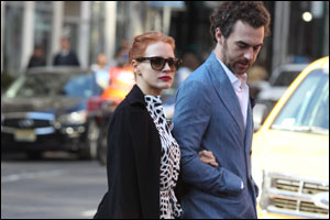 Jessica Chastain and Emma Roberts wearing  the Longchamp Le Pliage® Héritage, their new favorite handbag